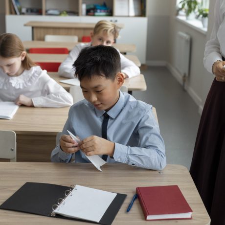 boy-with-adhd-making-paper-plane